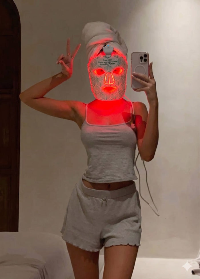 Mirror selfie wearing the Lumora LED mask